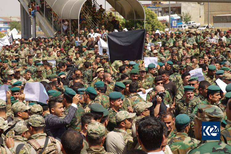 Peshmerga, security, and police forces protest in Sulaimani against Iraqi Parliament's decision to void their votes, June 13, 2018. (Photo: Kurdistan 24/Ibrahim Fatah)